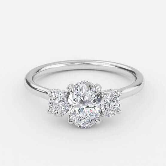 oval three stone diamond ring