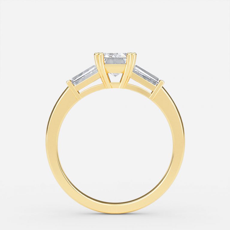 three stone engagement ring emerald cut